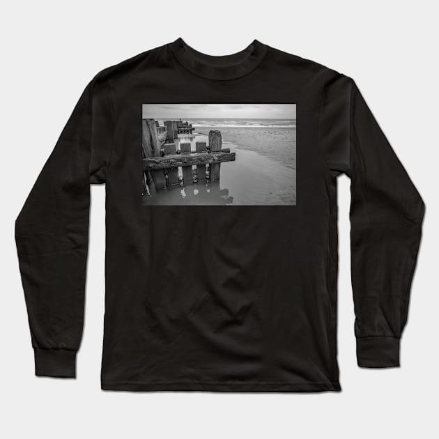 Wooden sea defences protecting the beach from coastal erosion Long Sleeve T-Shirt by yackers1